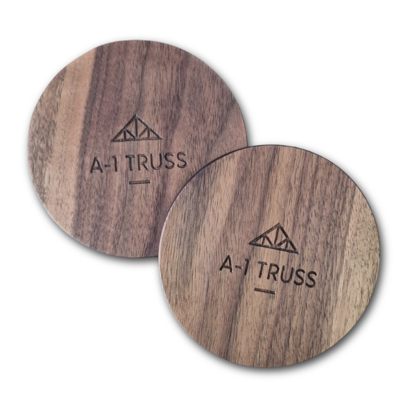 Two wooden coasters with logo on a white background